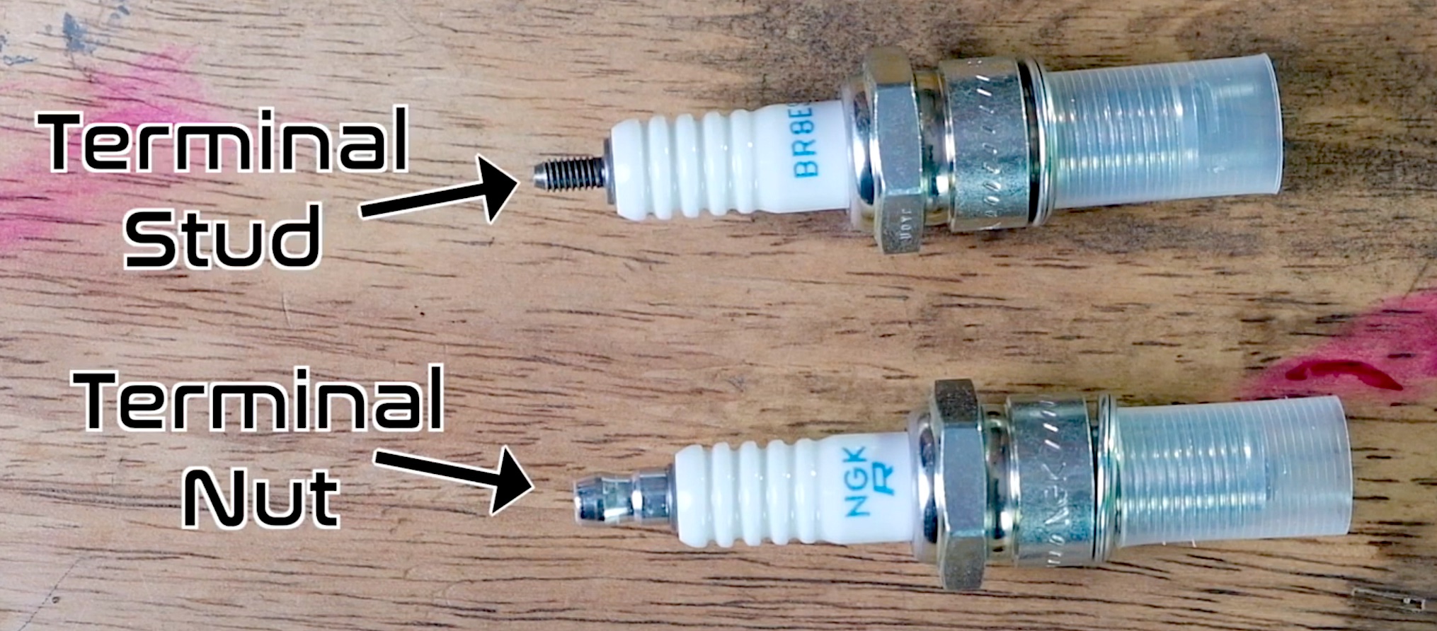 https://support.common-motor.com/hc/article_attachments/4987429238671/Terminal_nut_versus_terminal_stud_spark_plug_tip.jpg